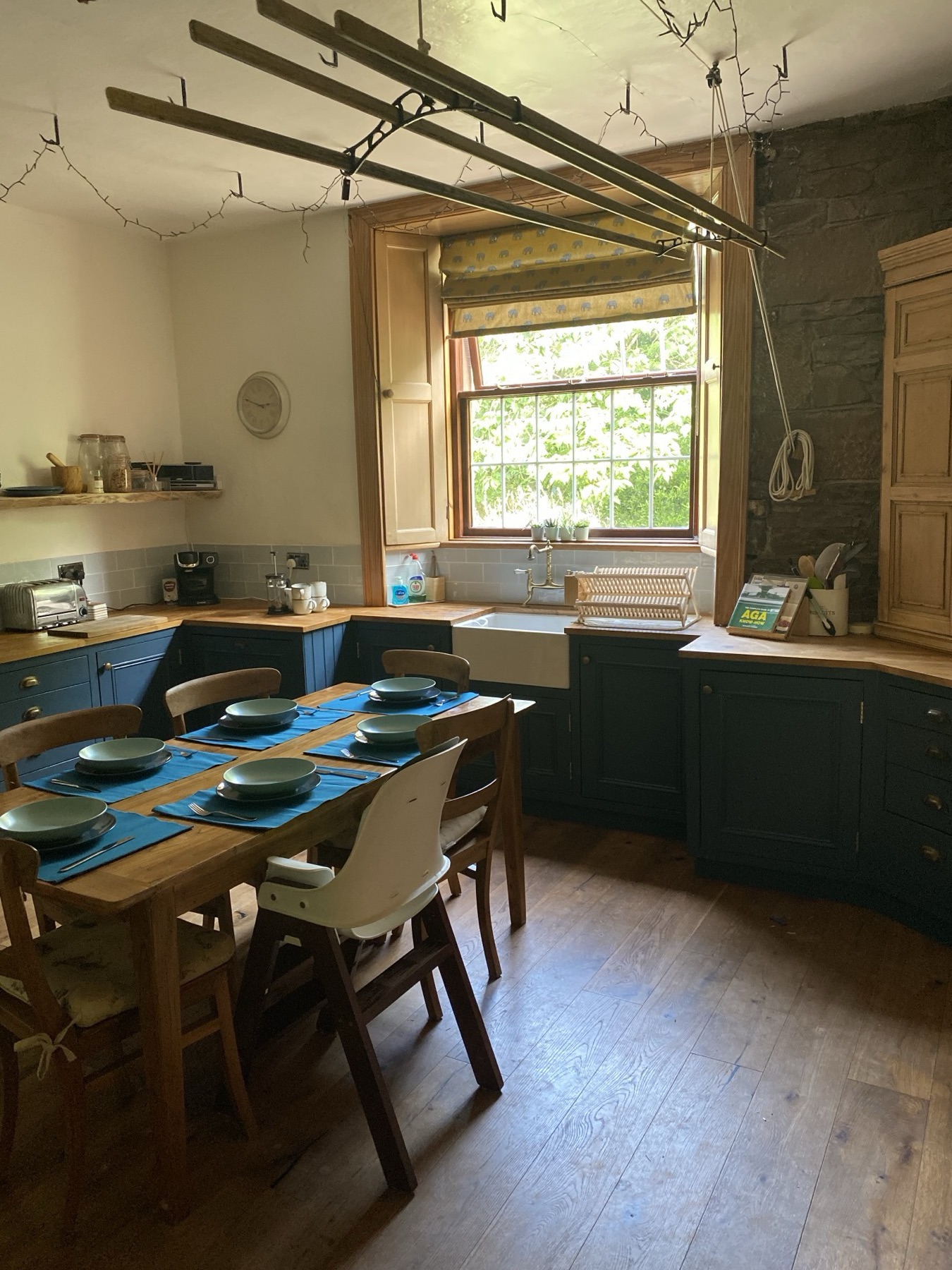 Solid wood worktops, Belfast sink, integrated appliances